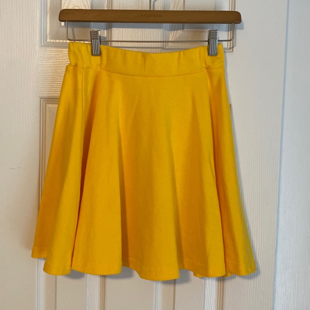 Women’s yellow skirt by Dani’s Choice in size small.